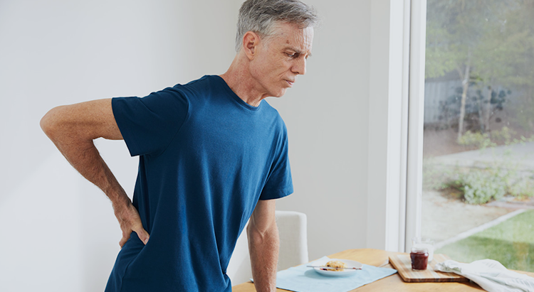 Pain specialist consultation with patient discussing chronic pain treatment